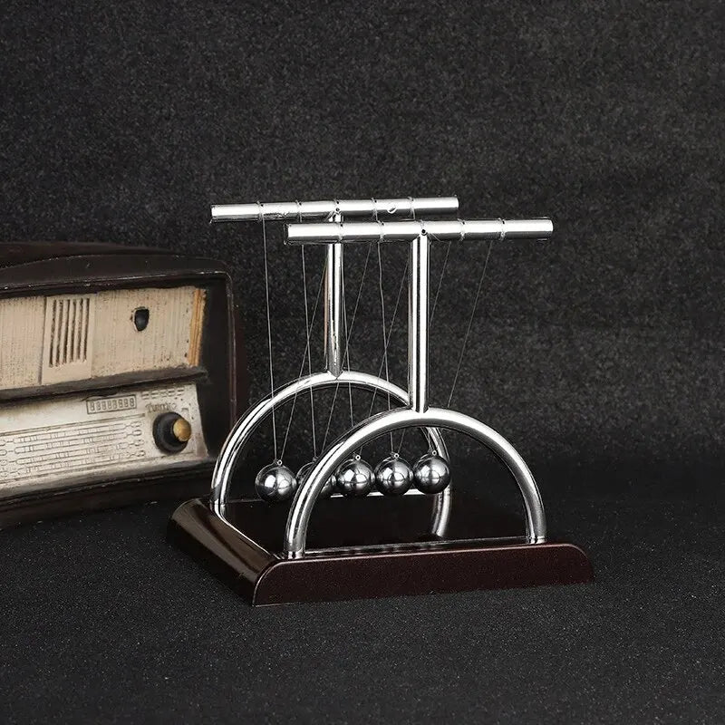 Newton's Cradle: The Classic Physics & Stress Relief Desktop Toy.